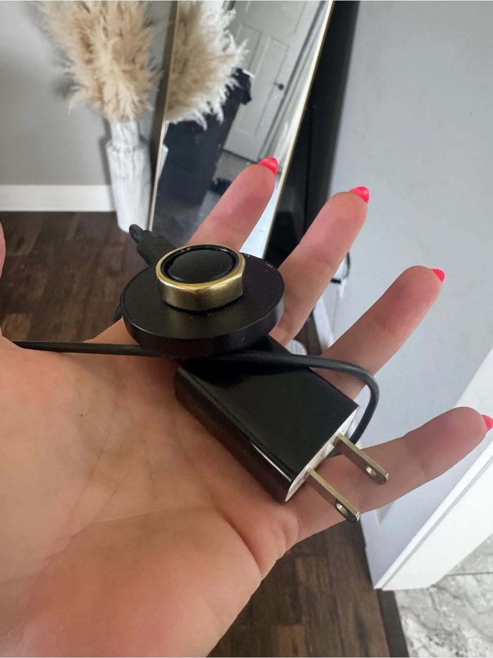 Oura Black Charging Dock with Gold Accent Ring